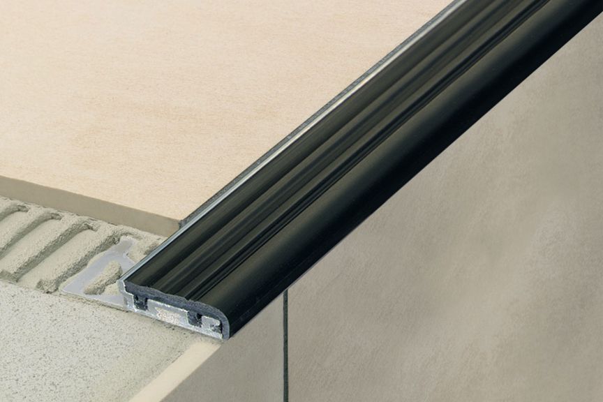 MAGMASCHLUTER SYSTEMS Schluter®-TREP-SE-S-B Stair-nosing profile with slip-resistant, thermoplastic rubber wear surface aluminumblack8 mm (5/16")-26 mm (1-1/32")- 150 cm (4' 11")SCHLUTER SYSTEMS Schluter®-TREP-SE-S-B Stair-nosing profile with slip-resistant, thermoplastic rubber wear surface