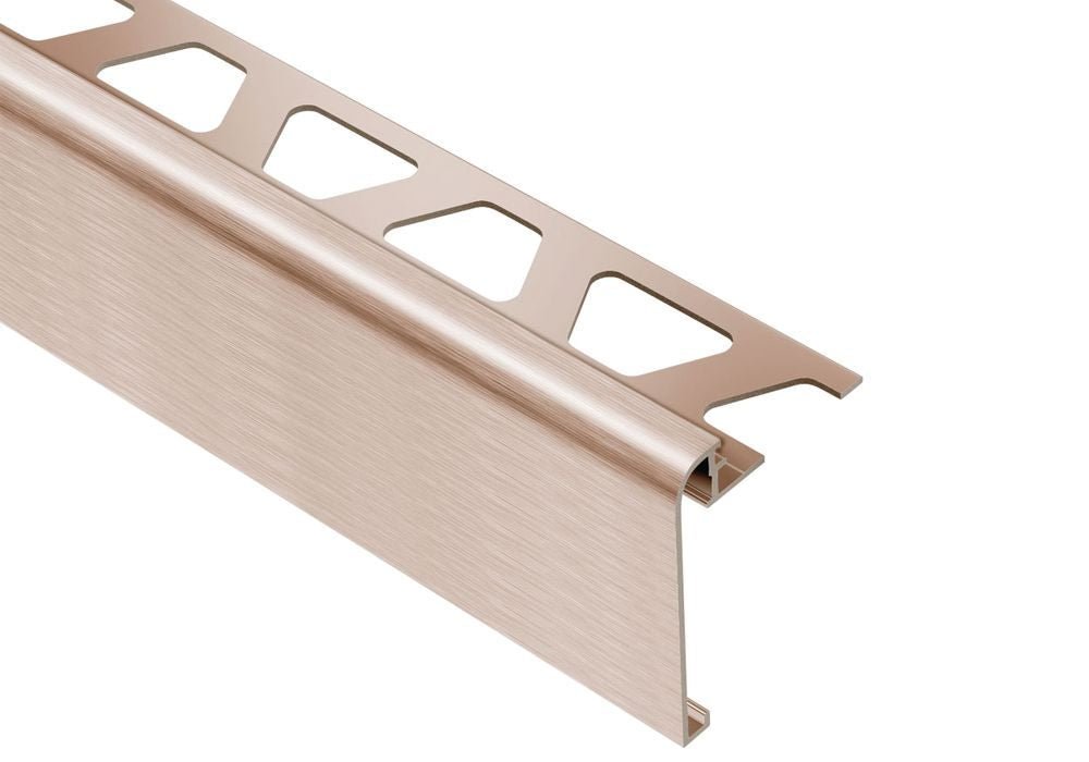 MAGMASCHLUTER SYSTEMS Schluter®-RONDEC-STEP Multi-functional profile covers the sub-assembly of countertops and stairs aluminumbrushed copper anodized8 mm (5/16")-39 mm (1-1/2")SCHLUTER SYSTEMS Schluter®-RONDEC-STEP Multi-functional profile covers the sub-assembly of countertops and stairs