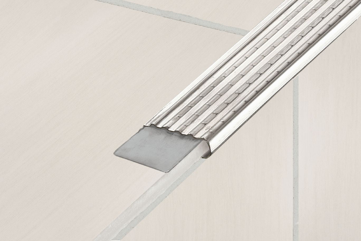 MAGMASCHLUTER SYSTEMS Schluter®-TREP-E/-EK Stair-nosing profile with slip-resistant wear surface stainless steel V2Astainless steel2 mm (3/32")-150 cm (4' 11")SCHLUTER SYSTEMS Schluter®-TREP-E/-EK Stair-nosing profile with slip-resistant wear surface