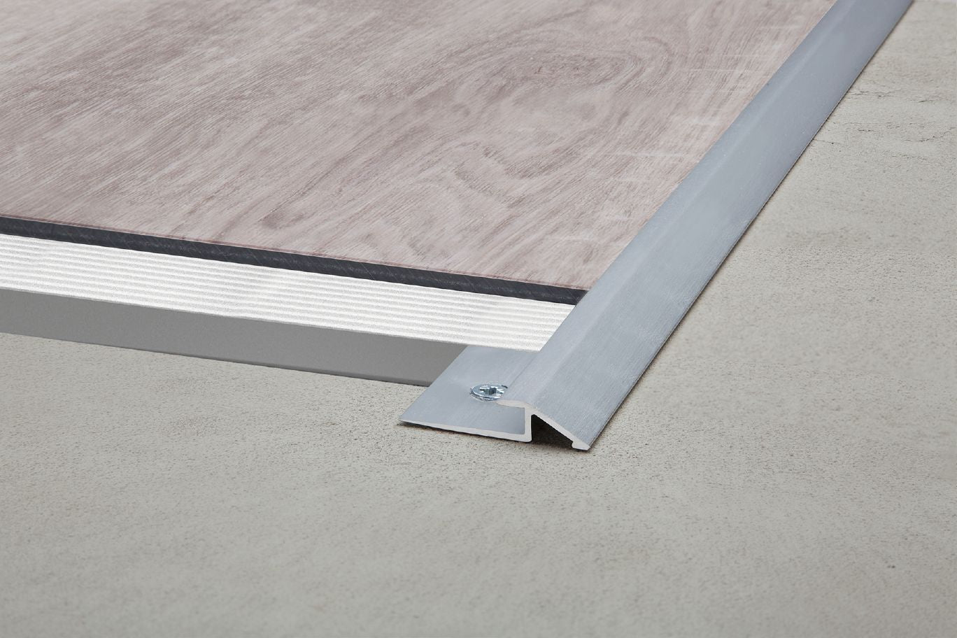 MEGMASCHLUTER SYSTEMS Schluter®-VINPRO-U Resilient surface floor profile for reducing to lower elevations aluminumbrushed antique bronze anodized3 mm (1/8 ")SCHLUTER SYSTEMS Schluter®-VINPRO-U Resilient surface floor profile for reducing to lower elevations