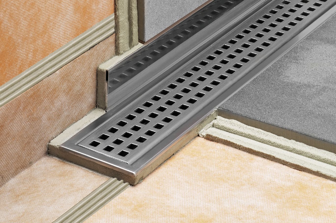 SCHLUTER SYSTEMSSCHLUTER SYSTEMS Schluter®-SHOWERPROFILE-R Transition profile covers exposed wall where floor slopes to linear drain stainless steel V2Abrushed stainless steel23 mm (29/32")-35 mm (1-3/8")-100 cm (3' 3")SCHLUTER SYSTEMS Schluter®-SHOWERPROFILE-R Transition profile covers exposed wall where floor slopes to linear drain